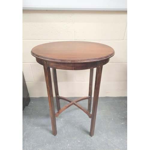 472 - Early 20th century oval mahogany occasional table on square supports with X understretchers. W.53cm.