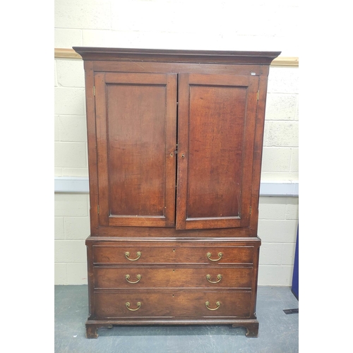 474 - Early 19th century oak press cupboard with moulded pediment above pair of single panel cupboard door... 