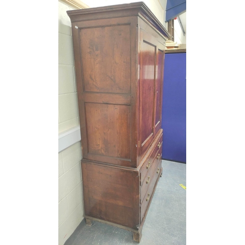 474 - Early 19th century oak press cupboard with moulded pediment above pair of single panel cupboard door... 