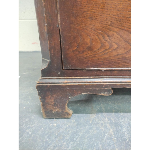 474 - Early 19th century oak press cupboard with moulded pediment above pair of single panel cupboard door... 