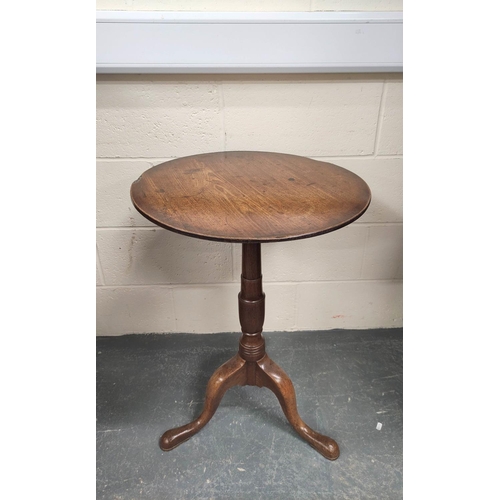 477 - George III circular mahogany occasional table on turned column and downswept tripod supports with pa... 