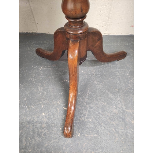 478 - Late Georgian circular mahogany occasional table on ring turned baluster column and downswept tripod... 