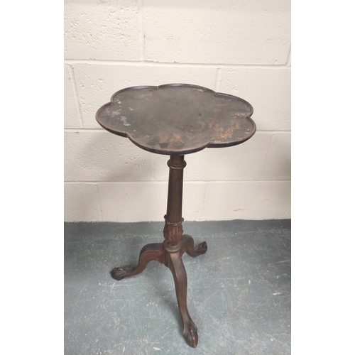 479 - Edwardian mahogany wine table, the lobed circular top on ring and leaf carved turned column with dow... 