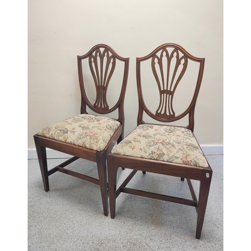 480 - Set of seven 19th century mahogany dining chairs in the Hepplewhite style, including a carver armcha... 