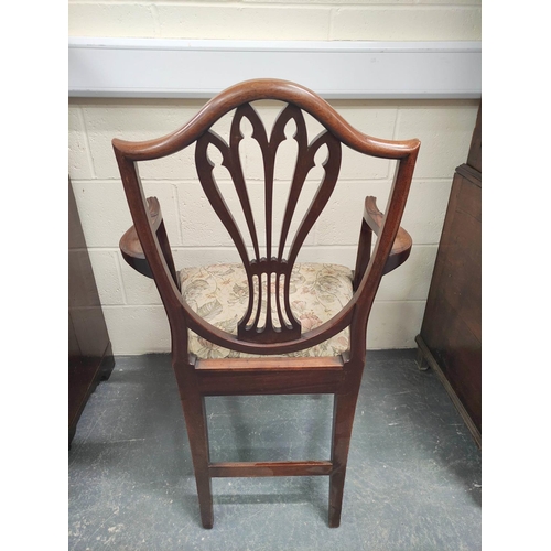 480 - Set of seven 19th century mahogany dining chairs in the Hepplewhite style, including a carver armcha... 