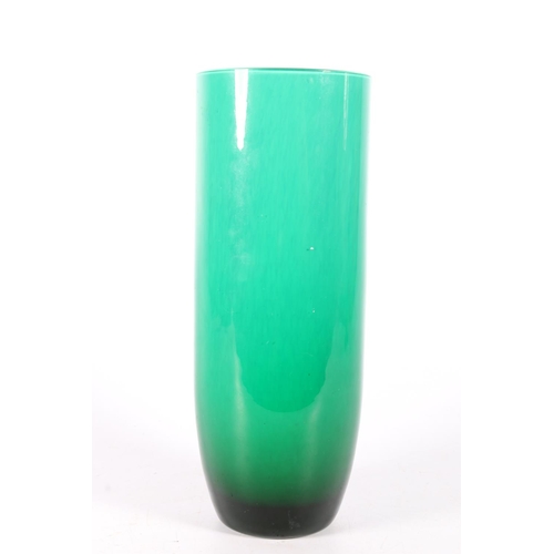 64 - Art glass vase with blue interior and slightly mottled green exterior, 20cm.