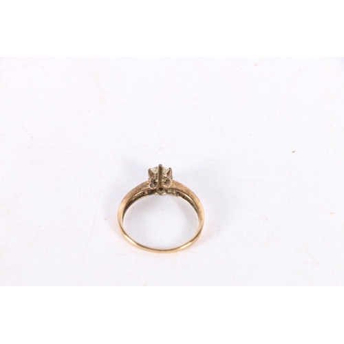 354 - 9K gold CZ set dress ring, 1.8grams.