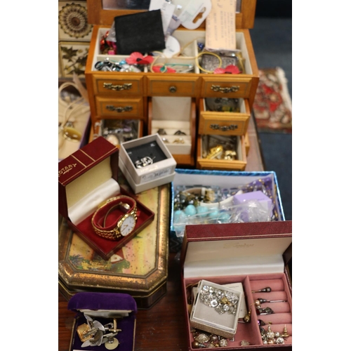 373 - Costume jewellery, and a jewellery chest and contents.