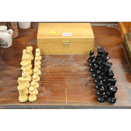 374 - Carved wood chess set.