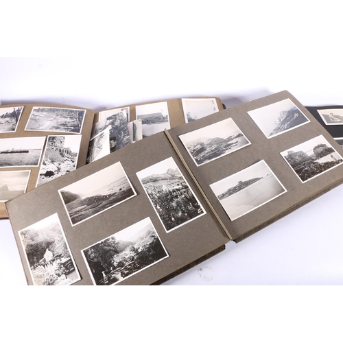 375 - Three albums containing a large quantity of black & white photographs, including India, France, ... 