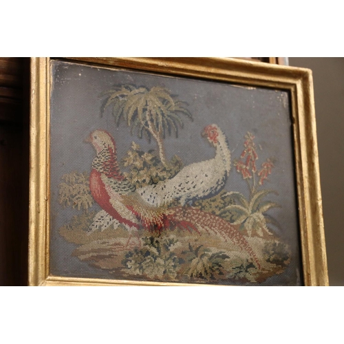 466 - Pair of Victorian wool tapestries, one of a ship, the other of birds, frame size 22cm x 27cm. (2)