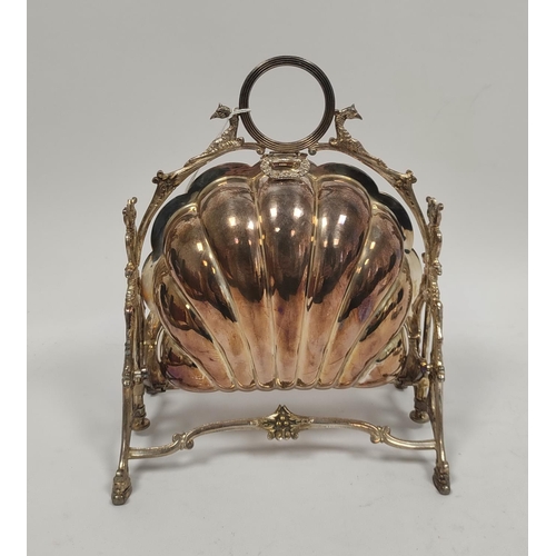 93 - Victorian e.p. biscuits container of scallop shape, on scrolling supports, by Rogers c1900.