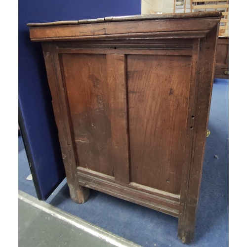 464 - Antique oak coffer, plank top above four panel front on stile supports. H.80cm, W.147cm, D.57cm.