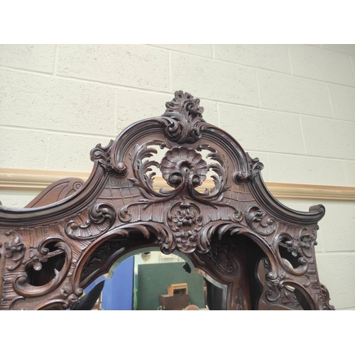 467 - Ornate late Victorian mahogany side cabinet, c.1900, with canopy top above mirror, central drawer an... 