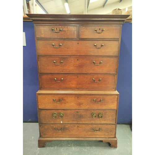 475 - George III oak chest on chest, the upper section with moulded pediment above two short and three lon... 