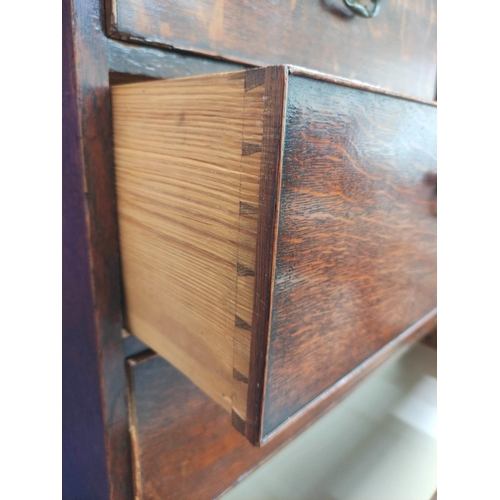 475 - George III oak chest on chest, the upper section with moulded pediment above two short and three lon... 