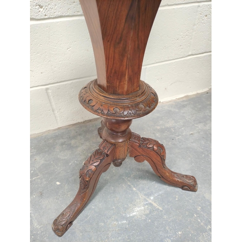 484 - Victorian inlaid walnut sewing table, the octagonal marquetry inlaid games top, enclosing side lined... 