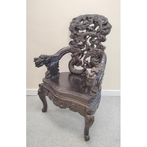 495 - Late 19th/early 20th century Chinese carved hardwood 'Dragon' elbow chair, on carved cabriole legs, ... 