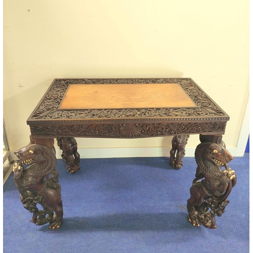 496 - 19th century Burmese carved hardwood hall table, the rectangular top with border and frieze of birds... 