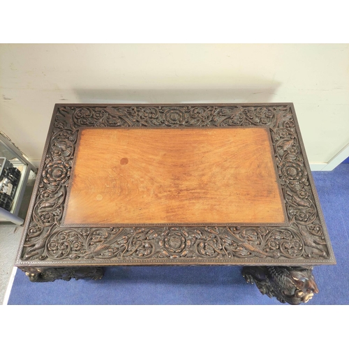 496 - 19th century Burmese carved hardwood hall table, the rectangular top with border and frieze of birds... 