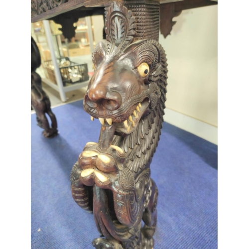 496 - 19th century Burmese carved hardwood hall table, the rectangular top with border and frieze of birds... 