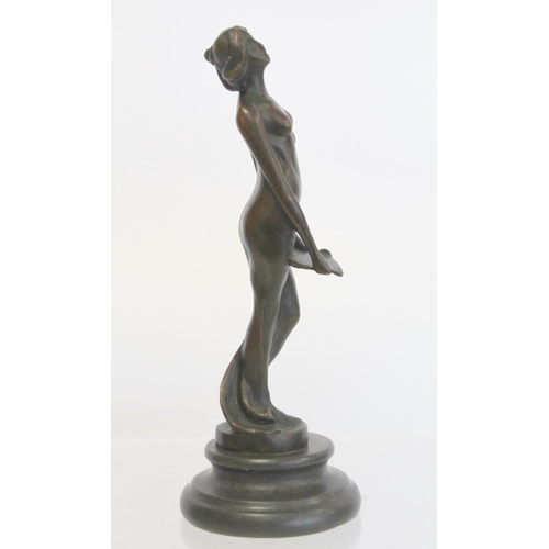 236 - Cast bronze figure of maiden in diaphanous dress holding a letter, on black slate, socle plinth base... 