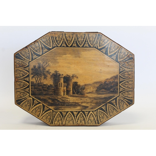 239 - Early 19th century penwork box of octagonal form, the central panel depicting a ruined castle by a l... 