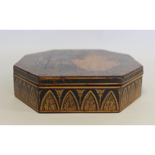 239 - Early 19th century penwork box of octagonal form, the central panel depicting a ruined castle by a l... 