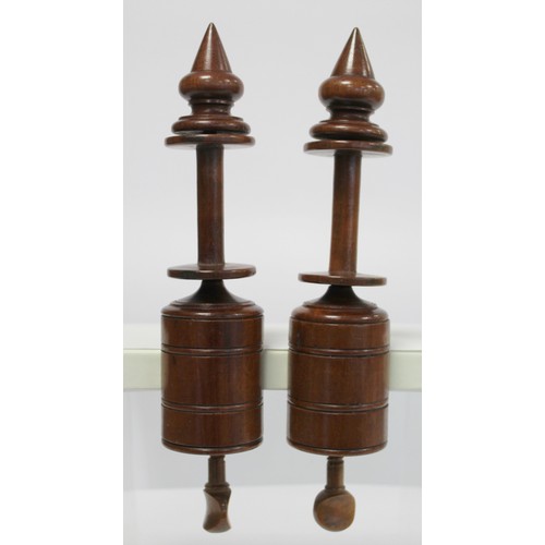 401 - Pair of treen turned walnut bobbin or spool winding clamps, each 28cm long; a carved knitting stick,... 