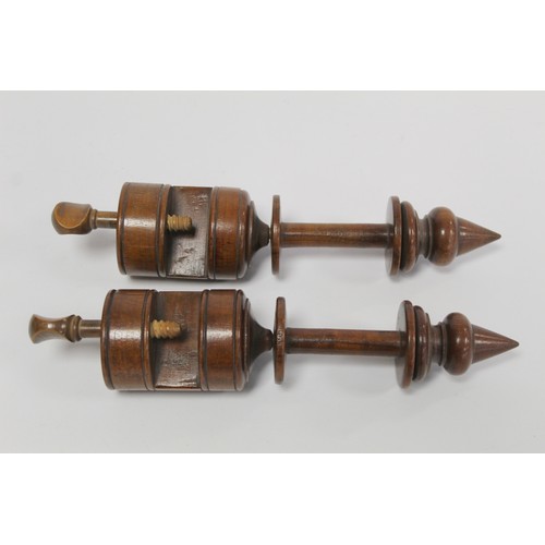 401 - Pair of treen turned walnut bobbin or spool winding clamps, each 28cm long; a carved knitting stick,... 