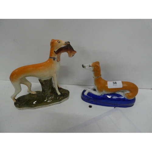 38 - Two Staffordshire greyhounds.