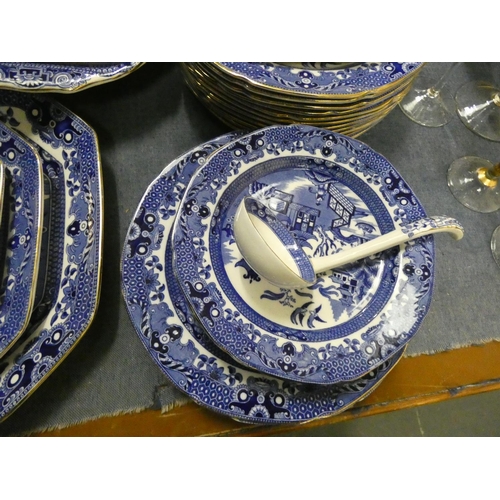 40 - Burleigh Ware blue and white willow pattern dinner service.