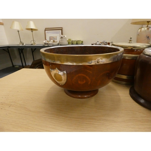 62 - Three treen biscuit barrels and large treen bowl.