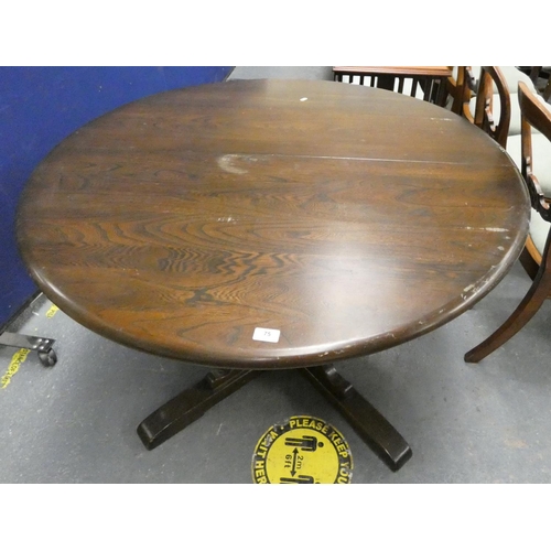 75 - Dark Ercol extending dining table.