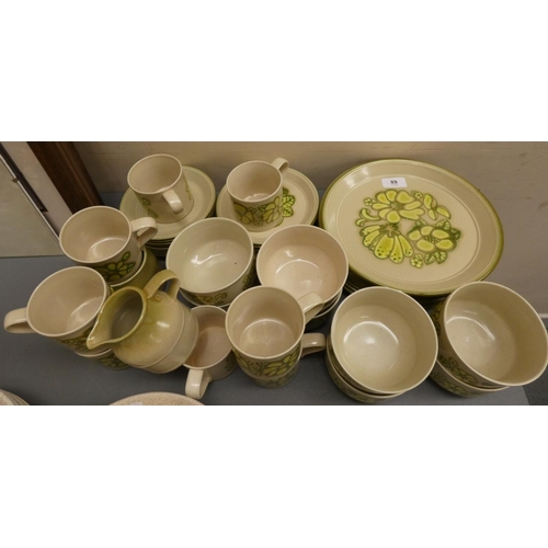 89 - Kiln Craft green floral dinner service.