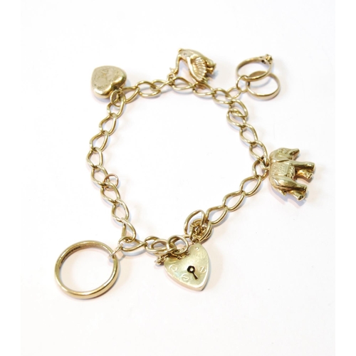 100 - 9ct gold curb bracelet with various charms, 16.4g.