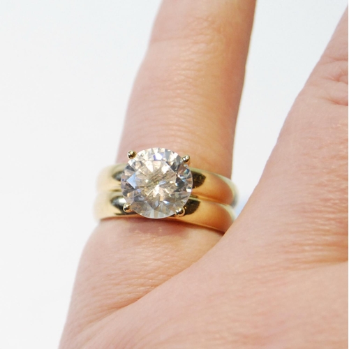 106 - Cubic zirconia ring with high four-claw setting, in gold, '14k', size L, 5.3g.