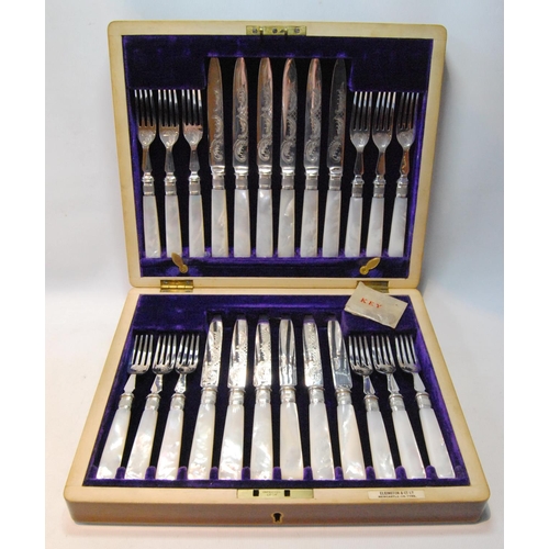 123 - Set of twelve EP fruit knives and twelve forks with pearl handles, inlaid mahogany case.