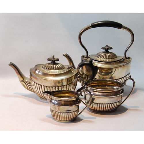 126 - Silver three-piece tea set of oval part-fluted shape, Edinburgh 1881 and Sheffield, 980g or 31½oz.