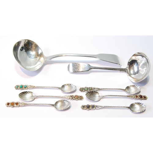 129 - Two silver sauce ladles, 1828 and 1844, and six coffee spoons with inset gem cabochons, '833', 110g ... 