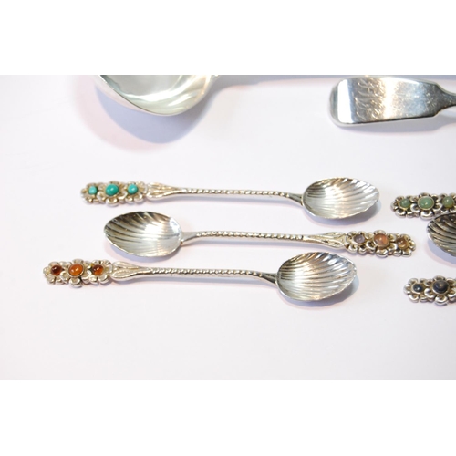 129 - Two silver sauce ladles, 1828 and 1844, and six coffee spoons with inset gem cabochons, '833', 110g ... 