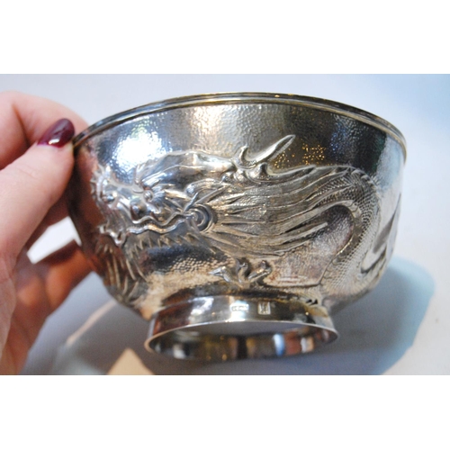 131 - Chinese silver hemispherical bowl, embossed with dragons, by Wang Hing, with character mark, c. 1900... 