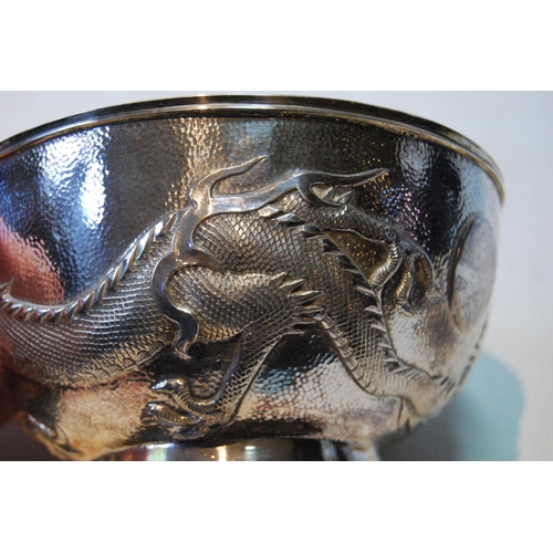 131 - Chinese silver hemispherical bowl, embossed with dragons, by Wang Hing, with character mark, c. 1900... 