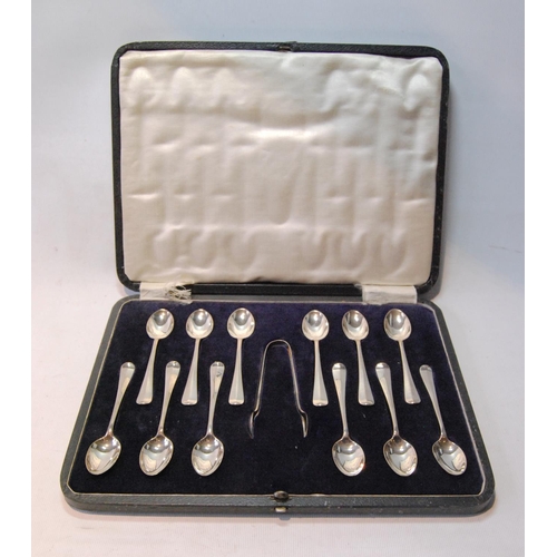 136 - Set of twelve silver coffee spoons and tongs, rat tail, cased, 127g or 4oz.