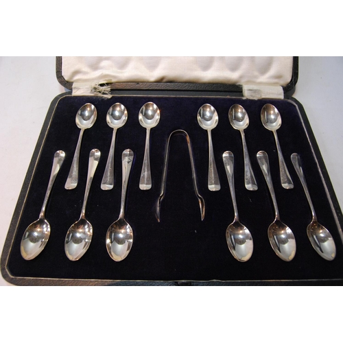 136 - Set of twelve silver coffee spoons and tongs, rat tail, cased, 127g or 4oz.