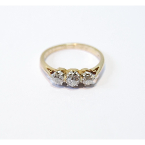 142 - Diamond three-stone ring, '18ct', size K.