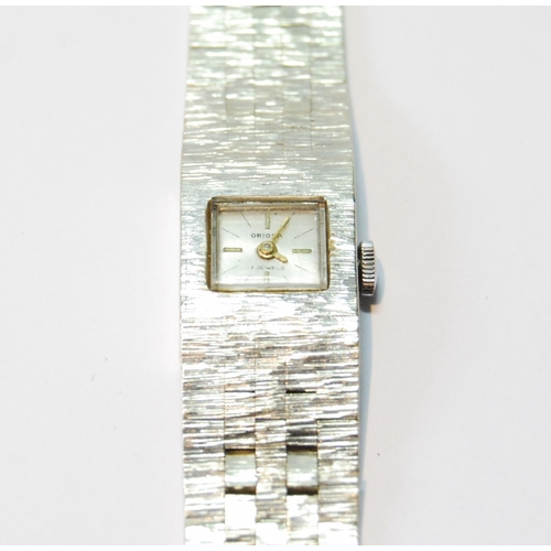 144 - Lady's Oriosa 9ct white gold bracelet watch, textured, 1967, 32g gross.