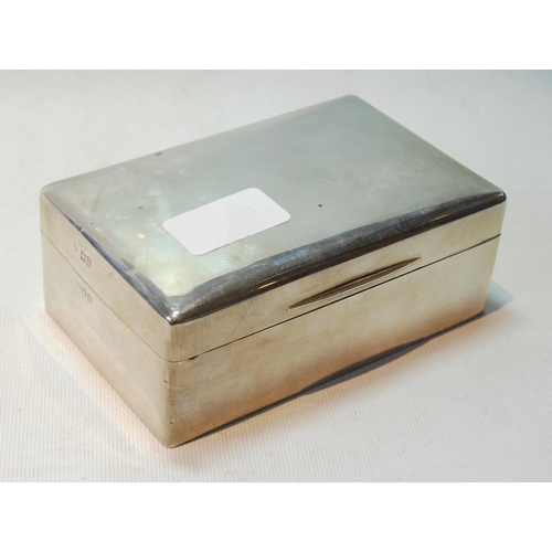 146 - Silver plain cigarette box, rectangular, with cushion top, 14cm.