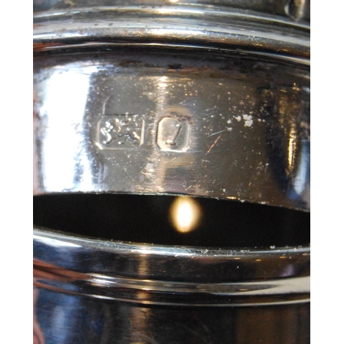 148 - Silver sugar caster of baluster shape, embossed, 1966, 161g or 5oz.