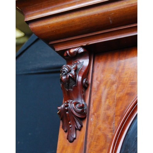 388 - Victorian mahogany library bookcase with two arched glazed doors enclosing a shelved interior, flank... 